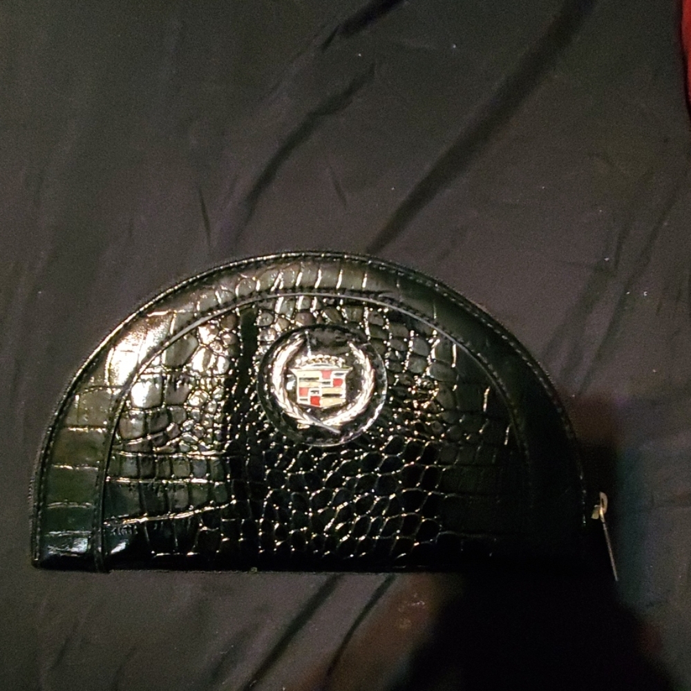 cadillac clutch wallet
